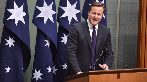 Britain&amp;#039;s Prime Minister David Cameron addresses the House of Representatives at Parliament House in Canberra 