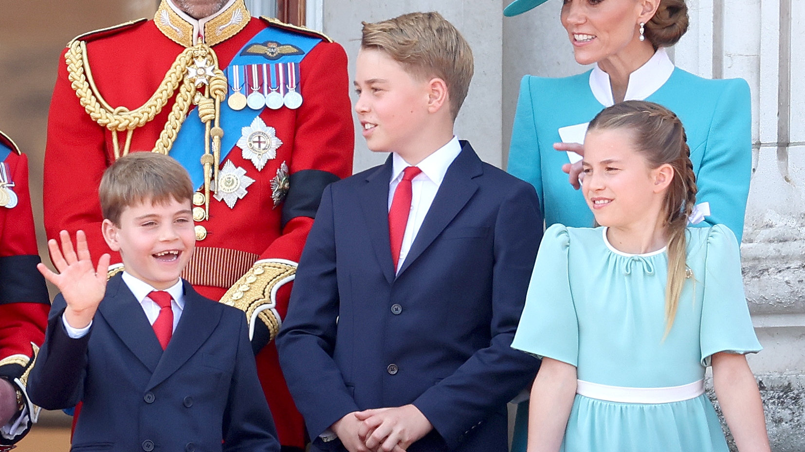 Prince George, Charlotte and Louis smile on the balcony of Buckingham Palace during Trooping The Colour 2025 on June 14, 2025