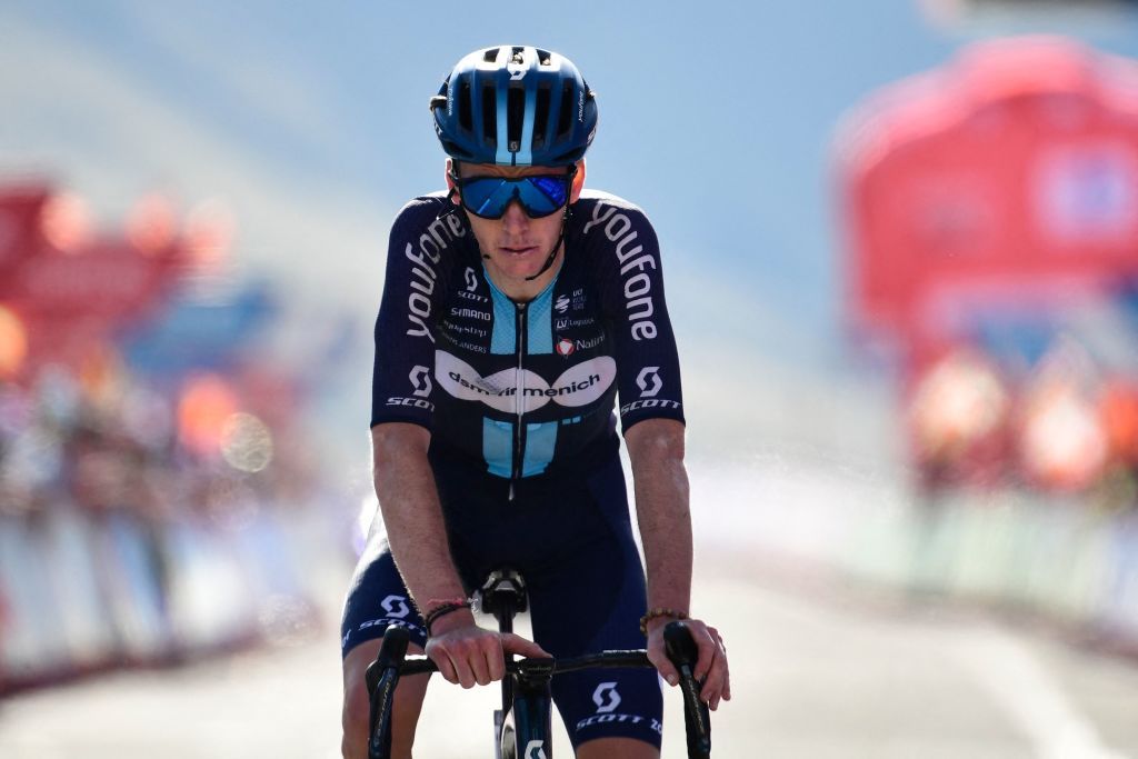 Team Dsms French rider Romain Bardet crosses second placed the finish line of the stage 14 of the 2023 La Vuelta cycling tour of Spain a 1562 km race between SauveterredeBearn and Larra Belagua on September 9 2023 Photo by ANDER GILLENEA AFP Photo by ANDER GILLENEAAFP via Getty Images