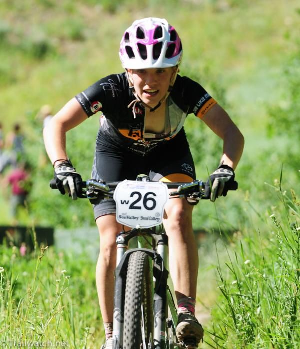 Jill Behlen (Tokyo Joe's) riding in third position near the start/finish area in the U23 race