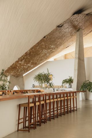 bar with concrete ceiling above