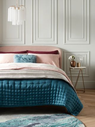 AW19 John Lewis & Partners Show-Wood Upholstered Bed Frame, Double, Topaz Pink, £699 Mongolian Cushion Soft Teal 30x40cm, £45 Hotel Silk Quilt Soft Teal 245 x 260, £280 John Lewis & Partners Boutique Hotel Linear Bedspread, Frost,