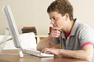 Teenage boy on the computer
