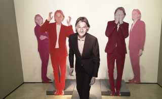 Life-size cut outs of the designer Paul Smith