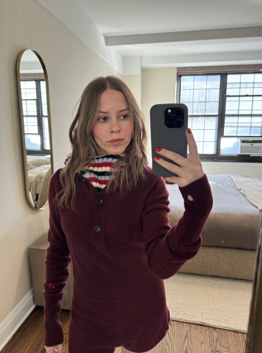 Nikki wears the balacava from the collab.