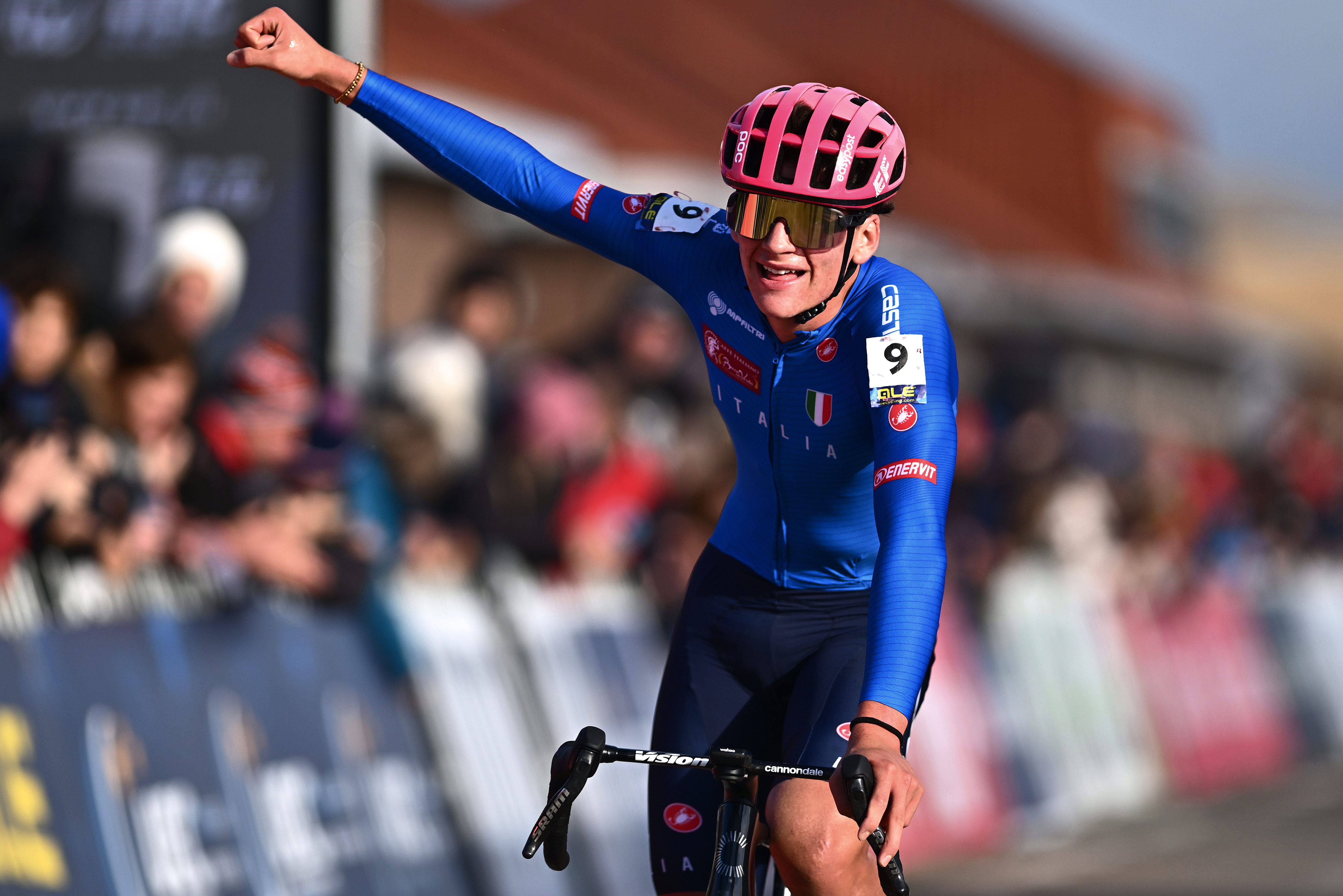 Mattia Agostinacchio punches air on bike