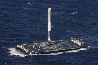 SpaceX’s Falcon 9 first stage is seen after successfully landing on a drone ship in the Atlantic Ocean in April 2016.