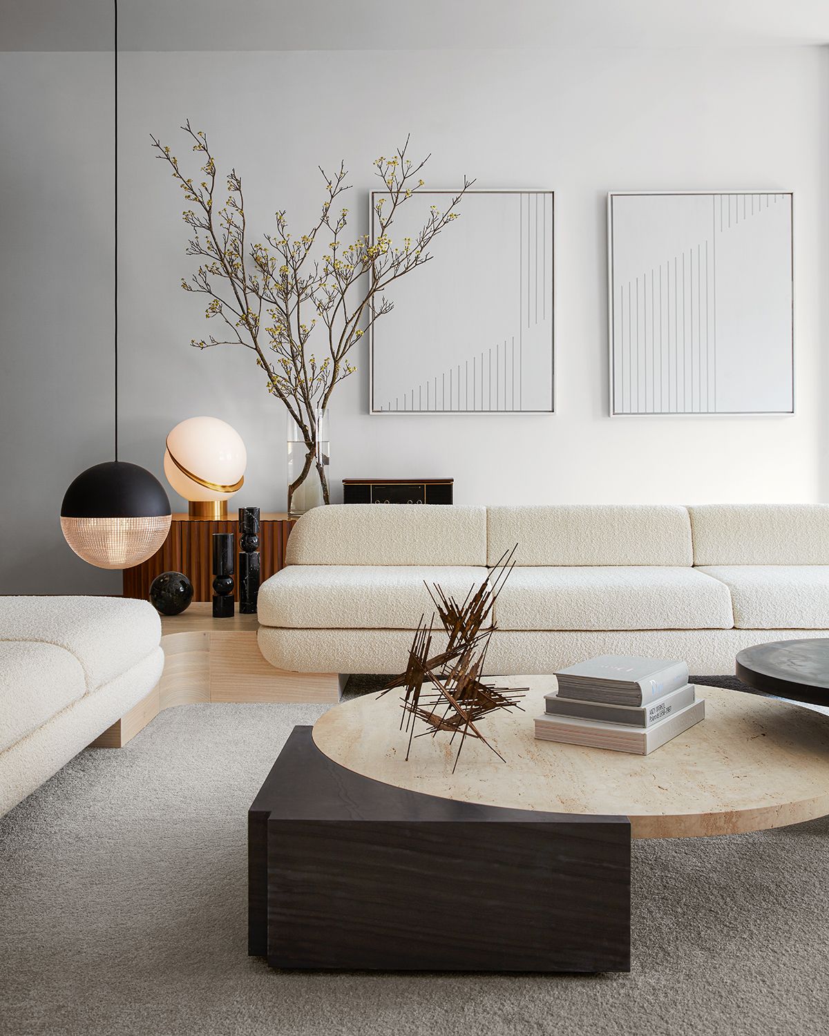 white sofa with modernist lighting by lee broom