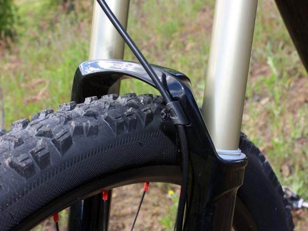 Goodbye zip-ties! The new Revelation lower leg casting includes an integrated hose clamp.