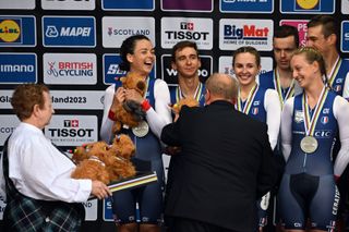 France team time trial squad with highland cows