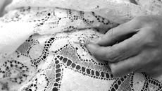 Repairing a piece of lace by hand