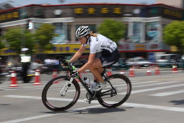 Toni Bradshaw (New Zealand) leads through a corner with one lap/7km to go