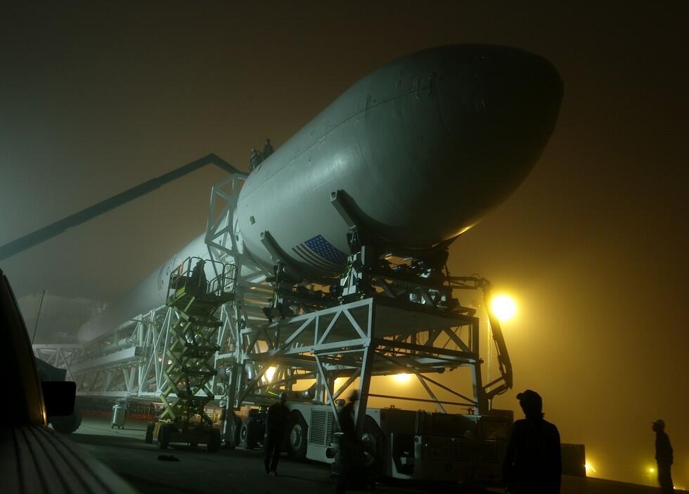 SpaceX&#039;s first upgraded Falcon 9 rocket, a Falcon 9 v1.1, rolls out to its launch pad at Vandenberg Air Force Base in California for a September 2013 launch debut. 