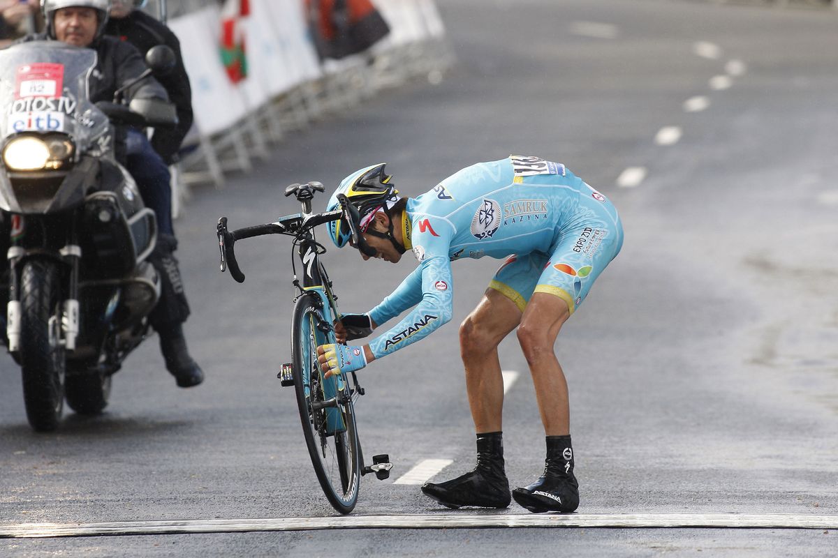 Diego Rosa (Astana) stopped, picked up his bike and walked across the line