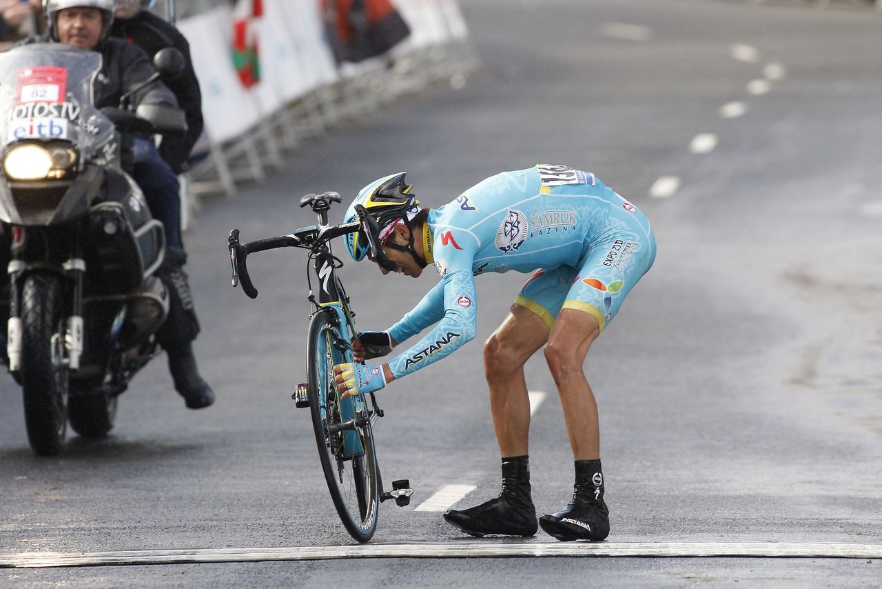 Diego Rosa (Astana) stopped, picked up his bike and walked across the line