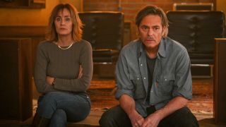 From left to right: Diane Farr as Sharon looking sad and Billy Burke as Vince looking sad in Fire Country. 
