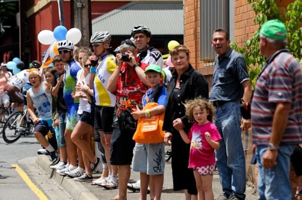 Crowds lines the street in all the town the stage passed through