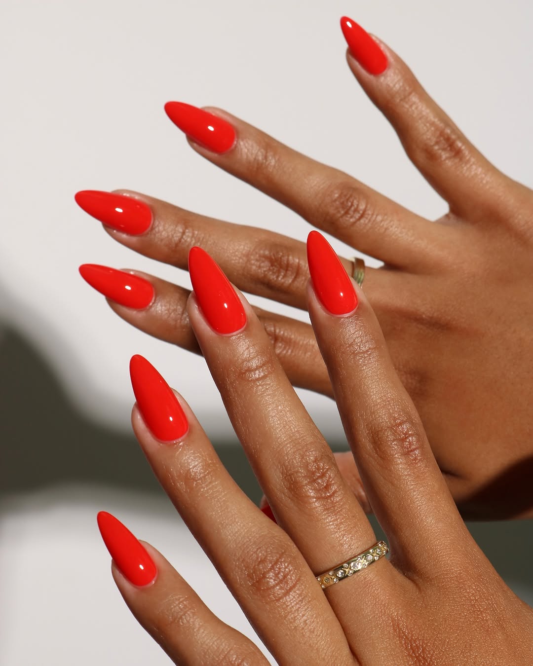 Orange-red nails from @craftedbyaprince