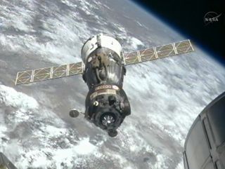 The Russian Soyuz TMA-03M backs away from the International Space Station after undocking on July 1, 2012.