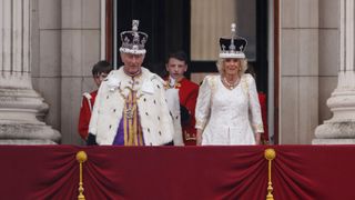 king charles and queen camilla on the balcony