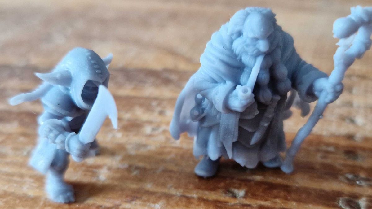 Two miniatures printed using an Elegoo Saturn 4 Ultra