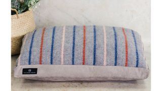 Striped Recycled Wool Dog Bed With Faux Suede Base, one of w&h's picks for Christmas gifts for dogs