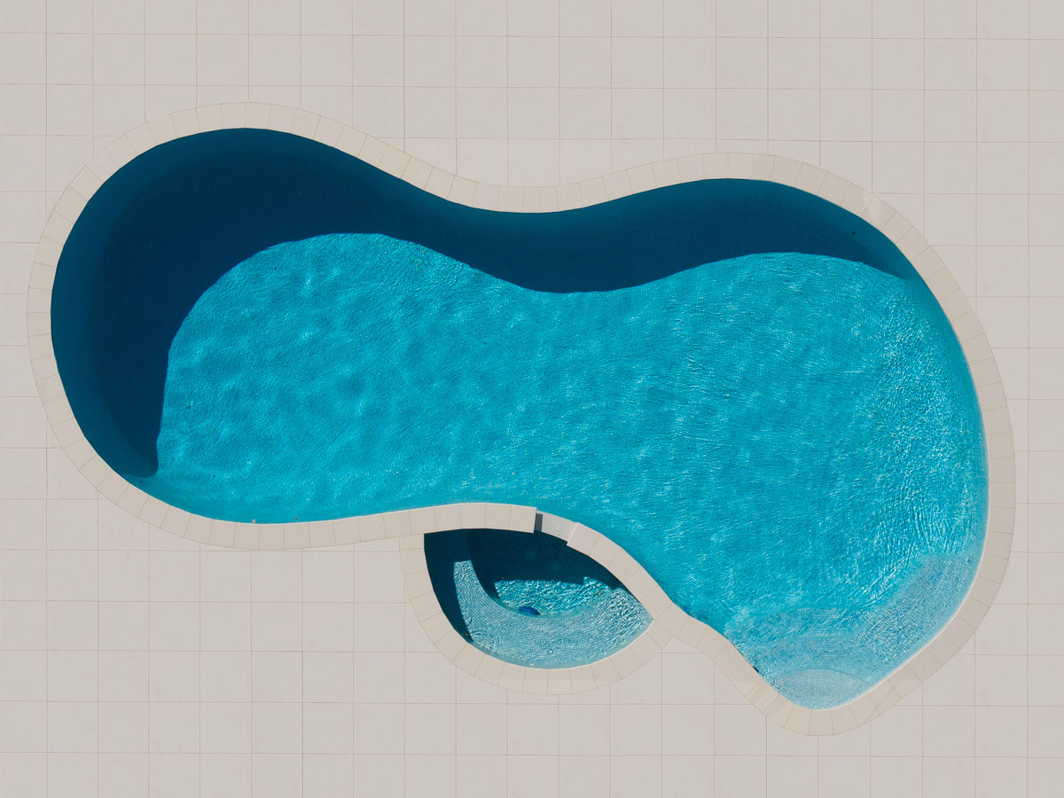 Aerial view of a blue swimming pool