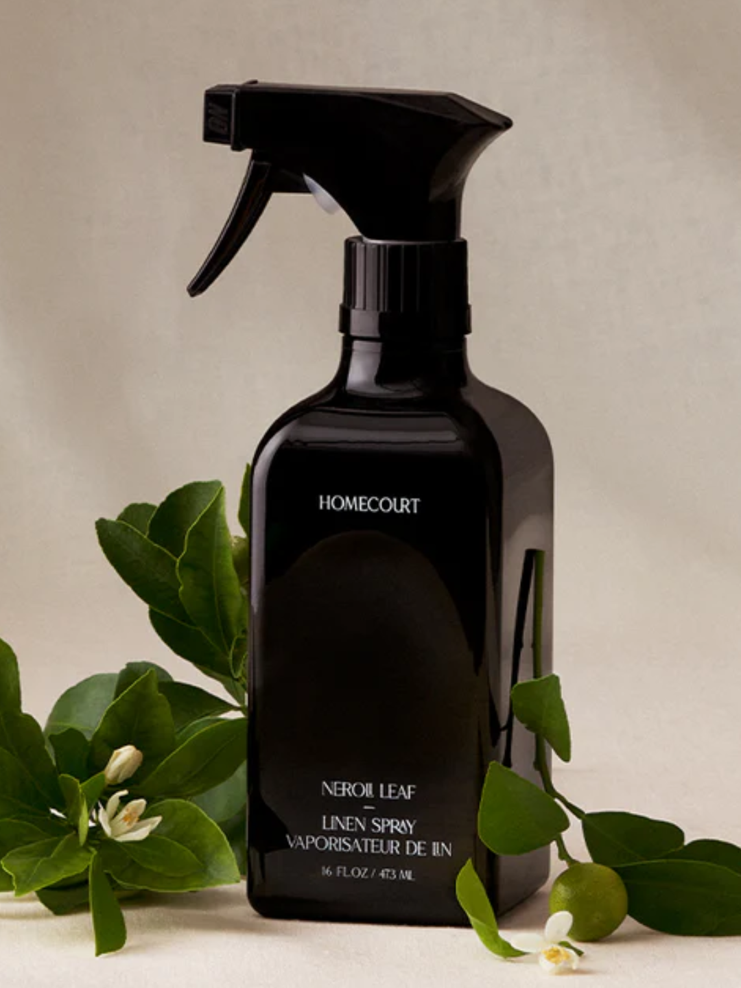 A dark bottle of linen spray from Homecourt