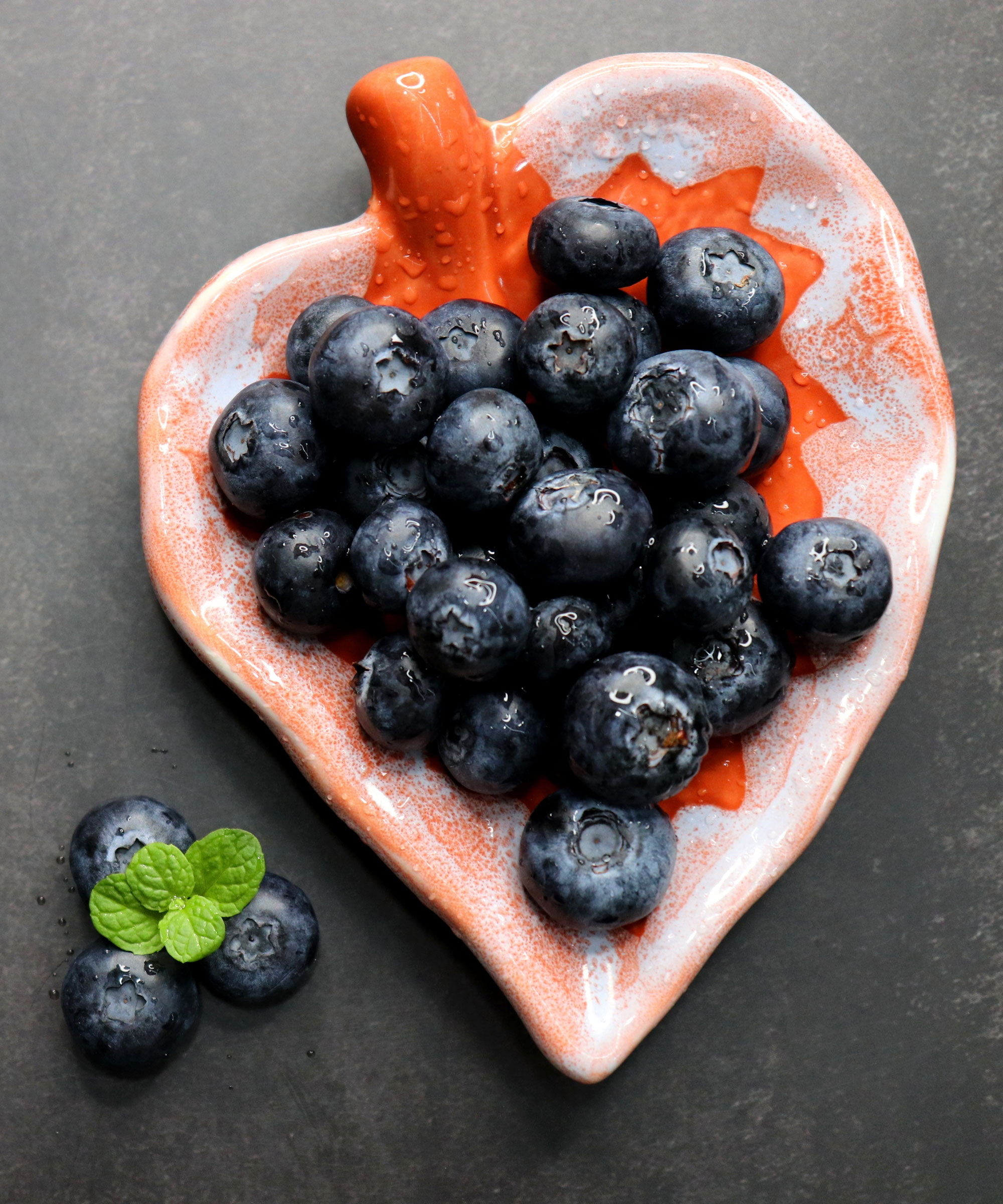 blueberry harvest on red heart shaped dish