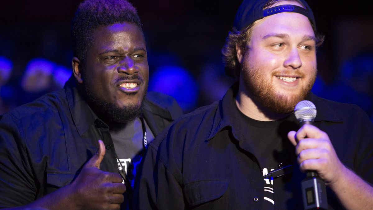 Twitch streamer DeejayKnight and Star Citizen community manager Tyler Witkin have fun in the crowd.