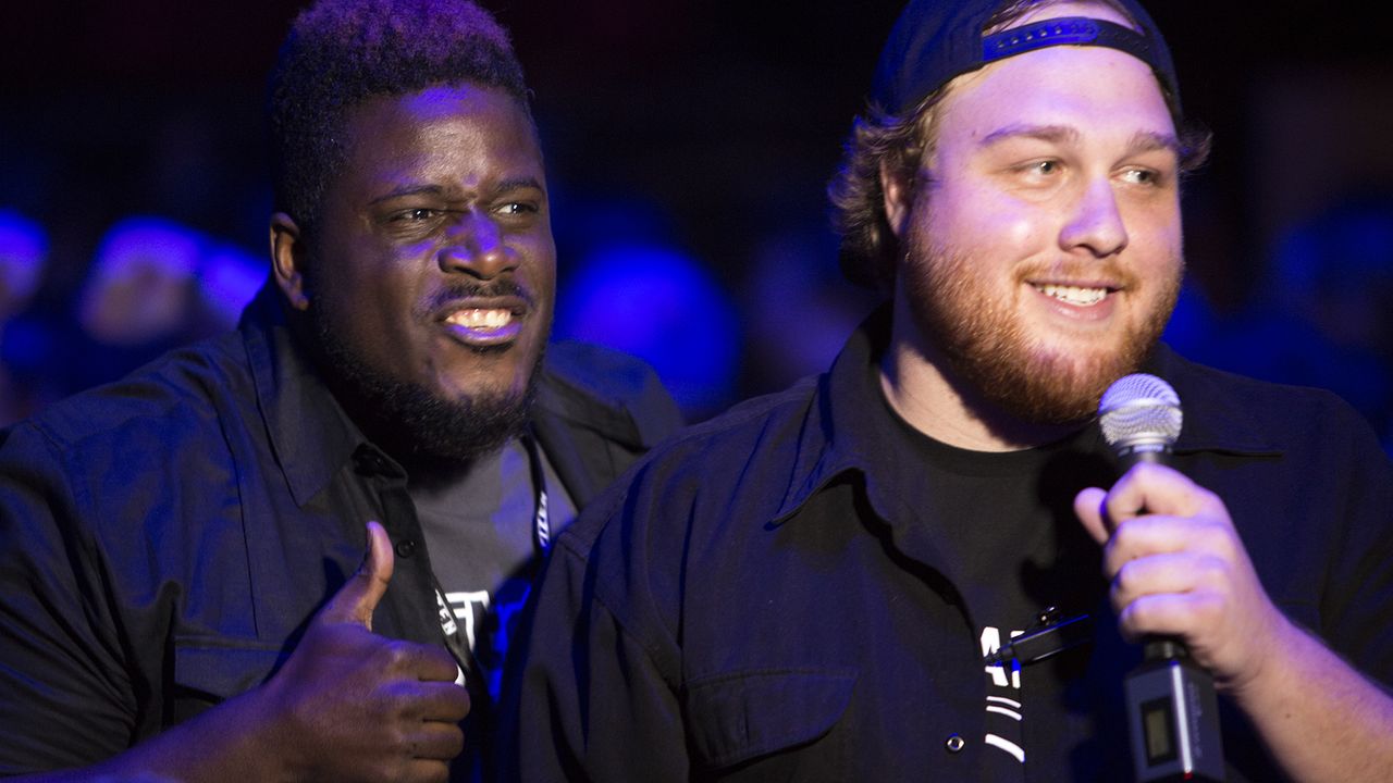 Twitch streamer DeejayKnight and Star Citizen community manager Tyler Witkin have fun in the crowd.