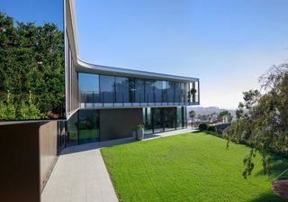 exterior of glass contemporary home in Bel Air