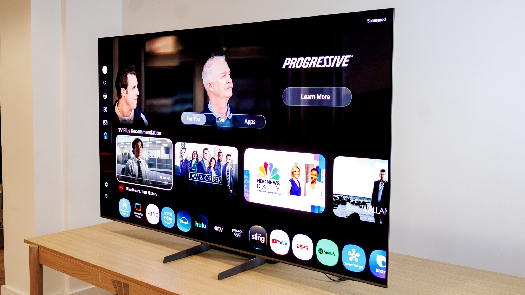 Samsung OLED S85F TV on a table