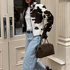 woman wearing black patent leather heels trend