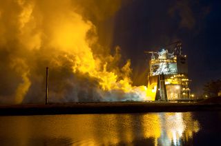 An RS-25 engine (formerly space shuttle main engine, SSME) fires for a 500-second test on Jan. 9, 2015 at NASA's Stennis Space Center in Mississippi.