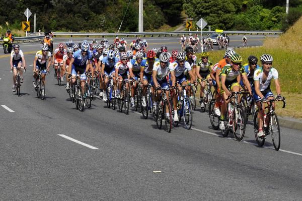 Aaron Strong leads the peloton up the climb