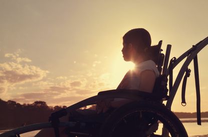 Teenage Girl In Wheelchair