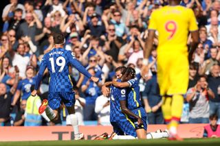 Trevoh Chalobah celebrates his goal with captain César Azpilicueta