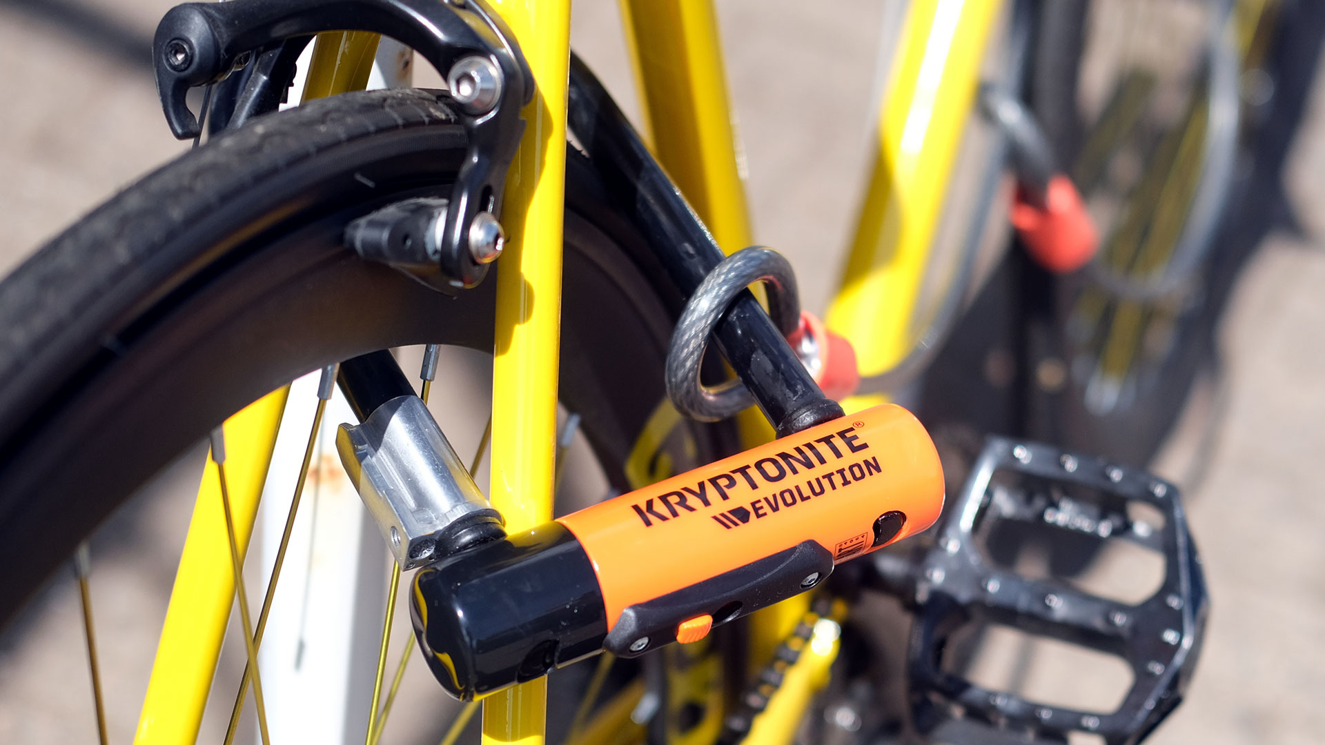 Bike locked with Kryptonite D-lock lock and cable