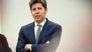 Sam Altman with his arms folded.