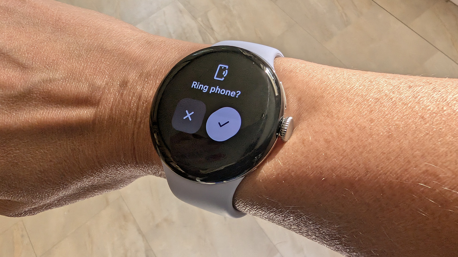 Google Pixel Watch 4 with Find My Phone on screen