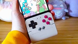 Close up of GameSir Pocket Taco with Zelda: Oracle of Ages cutscene of Link and Nayru on screen.