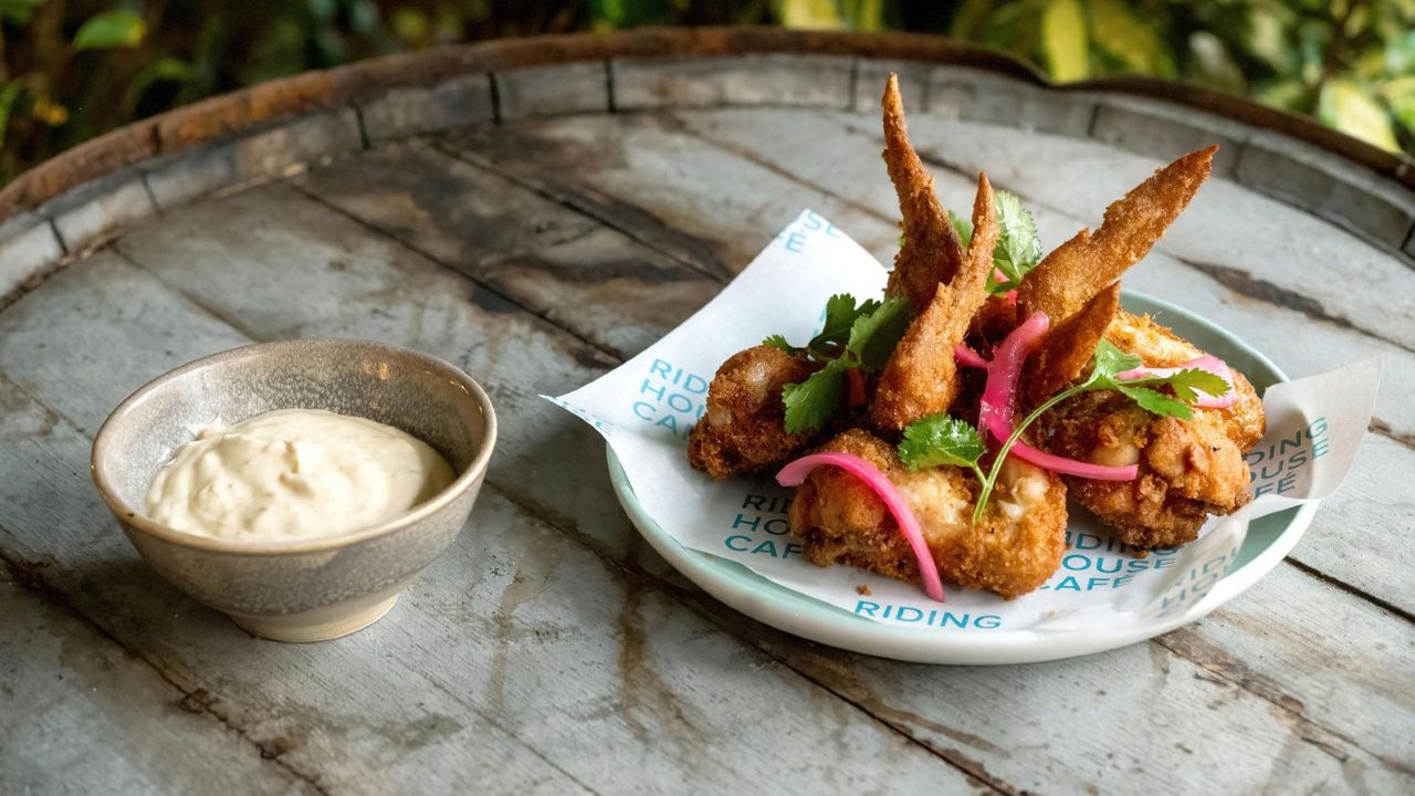 Chicken wings with Bajan pepper sauce and pickled onions by chef Henry Omereye