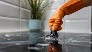 Cleaning an induction cooktop