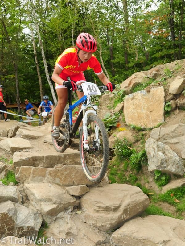 Zhaunzhuan Ye (China) heads down one of the many rocky sections of course.