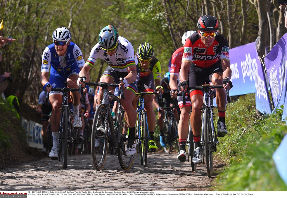 Greg Van Avermaet (BMC Racing) leads Peter Sagan and Matteo Trentin (QuickStep Floors)