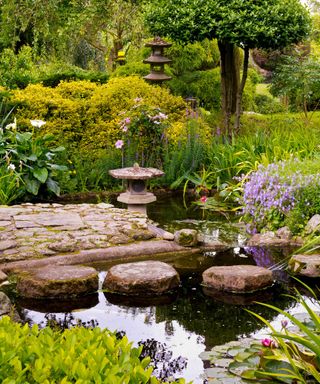 peaceful Zen garden with stone stepping stones over pond