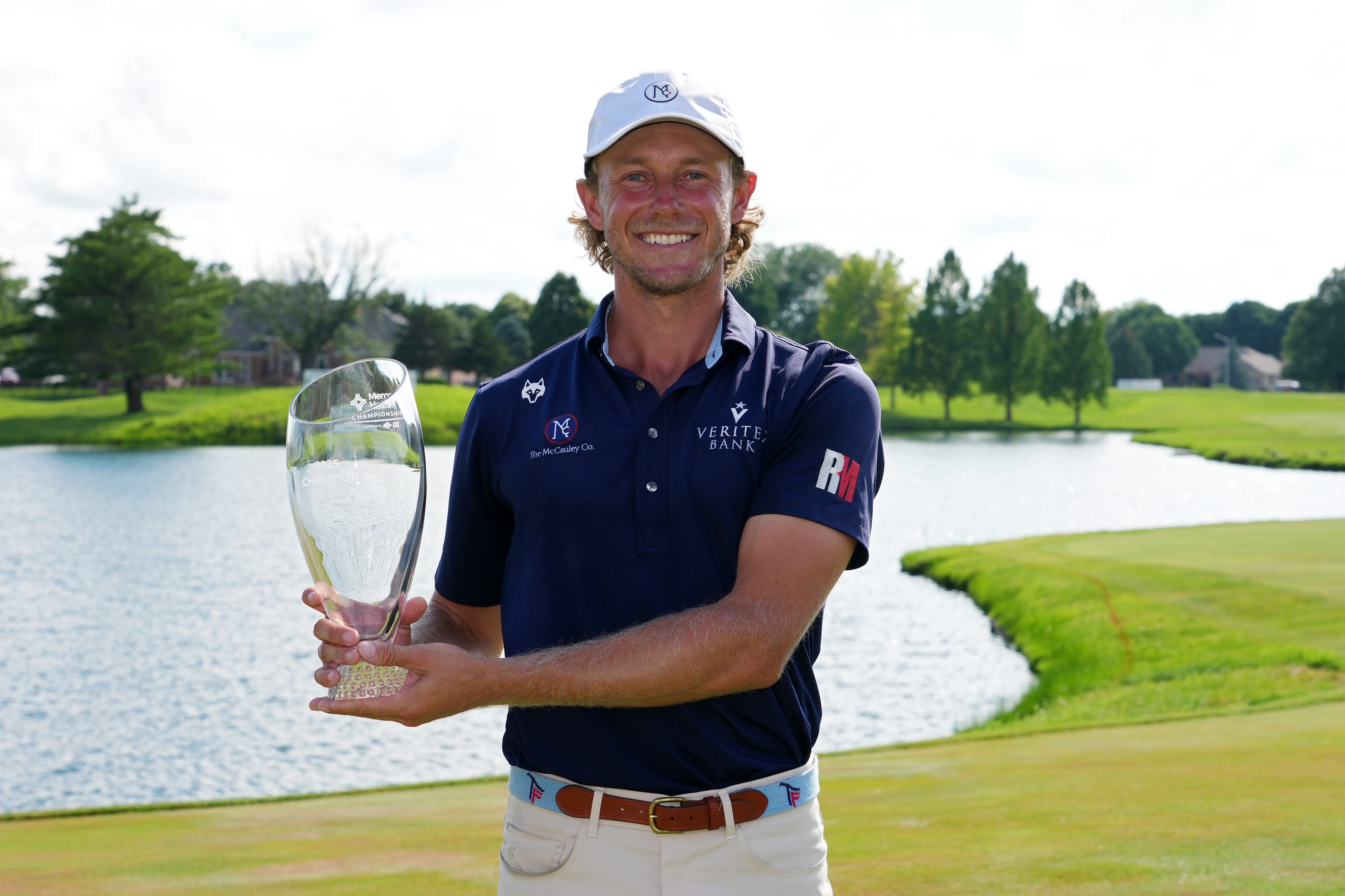 Austin Smotherman holds a trophy
