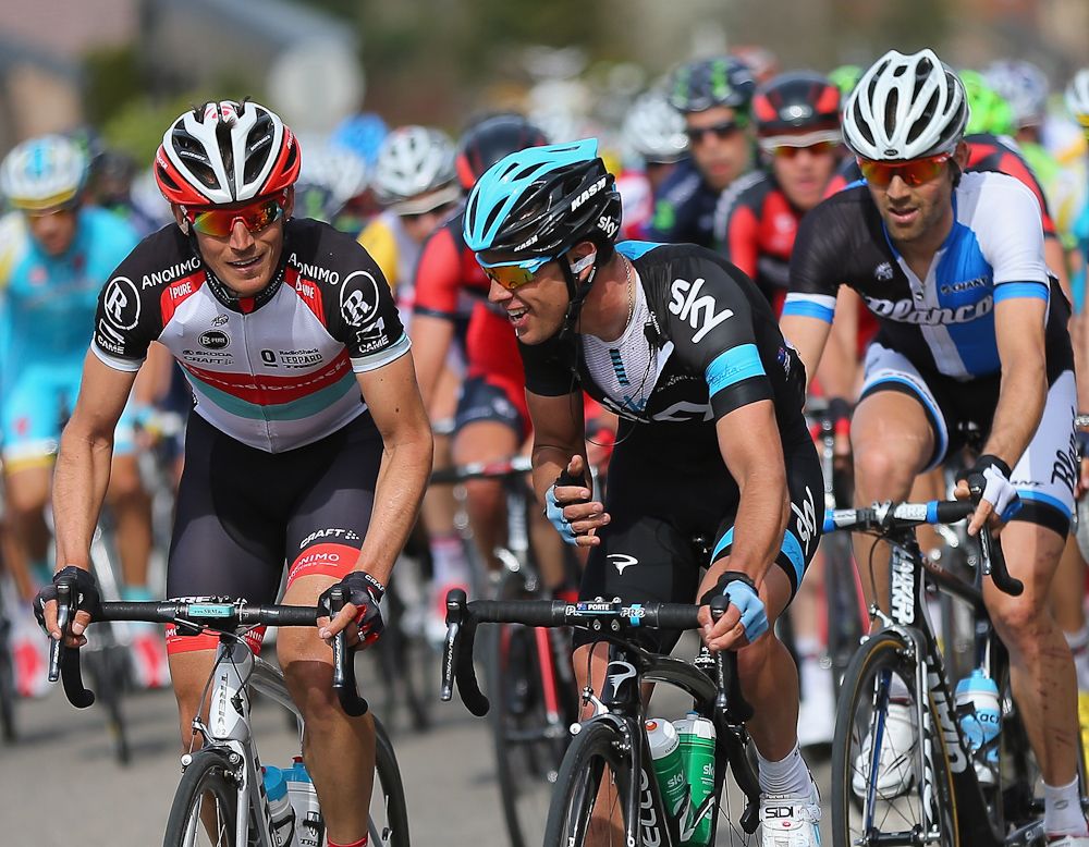 Richie Porte chats with Mathew Busche during the 77th edition of La Fleche Wallonne in 2013.