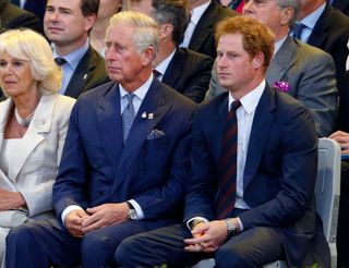 Prince Charles and Prince Harry attend the Opening Ceremony of the Invictus Games at the Queen Elizabeth Olympic Park on September 10, 2014 in London